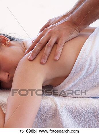 Shoulders massage View Large Photo Image Stock Image - Shoulders massage. Fotosearch