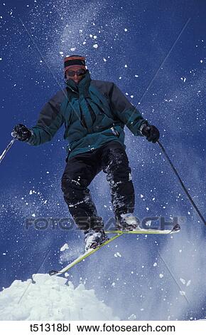 Skier jumping View Large Photo Image Stock Image - Skier jumping. Fotosearch