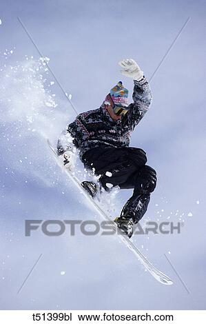 Snowboarder jumping View Large Photo Image Stock Image - Snowboarder jumping. Fotosearch