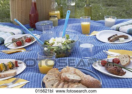 still life of barbecue picnic spread on blanket View Large Photo Image Stock Image - still life of barbecue picnic spread on blanket. Fotosearch