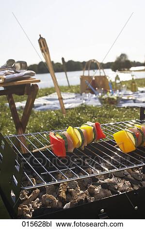 still life of barbecue with different shashlik on charcoal grill View Large Photo Image Stock Image - still life of barbecue with different shashlik on charcoal grill. Fotosearch