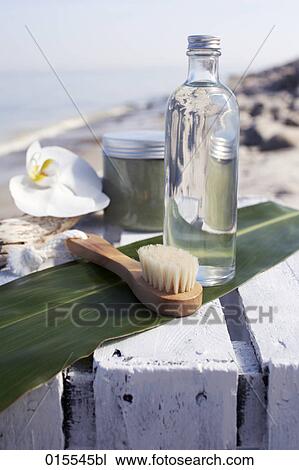 still life of brush and bottle with lotion on beach View Large Photo Image Stock Image - still life of brush and bottle with lotion on beach. Fotosearch
