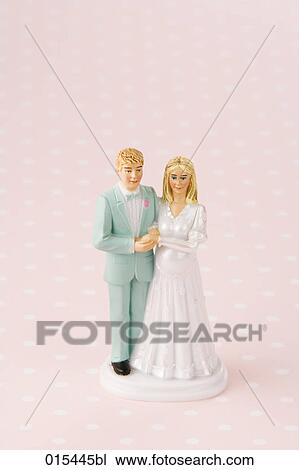 Stock Image - still life of figures of bridal couple. Fotosearch