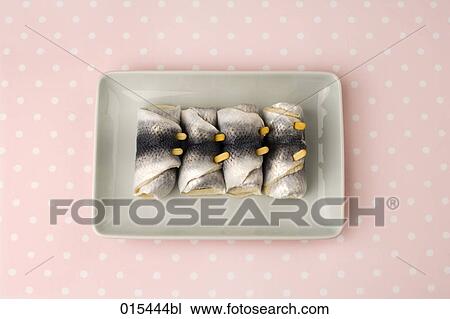 still life of four pieces of rollmops View Large Photo Image Stock Image - still life of four pieces of rollmops. Fotosearch