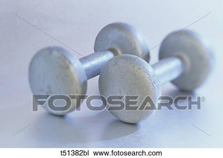 Stock Image - Still life of free weights. Fotosearch