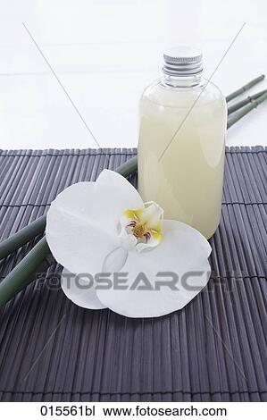 still life of orchid and cosmetics bottle View Large Photo Image Stock Image - still life of orchid and cosmetics bottle. Fotosearch