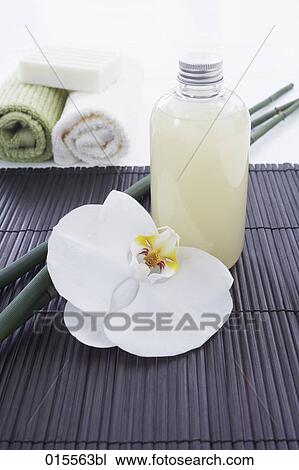 still life of orchid cosmetics bottle and towels View Large Photo Image Stock Image - still life of orchid cosmetics bottle and towels. Fotosearch