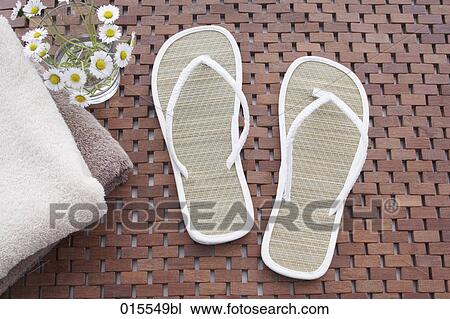 still life of pair of straw flip flops View Large Photo Image Stock Image - still life of pair of straw flip flops. Fotosearch