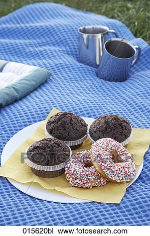 still life of picnic with muffins and donuts View Large Photo Image Stock Image - still life of picnic with muffins and donuts. Fotosearch