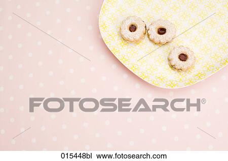 still life of three cookies on yellow plate View Large Photo Image Stock Image - still life of three cookies on yellow plate. Fotosearch