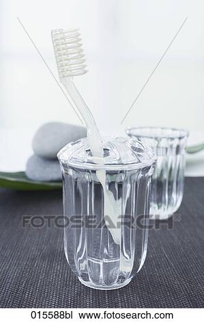 still life of toothbrush in glass View Large Photo Image Stock Image - still life of toothbrush in glass. Fotosearch