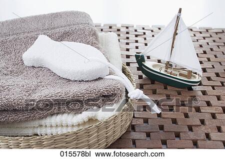 still life of towels sponge and toy boat View Large Photo Image Stock Image - still life of towels sponge and toy boat. Fotosearch