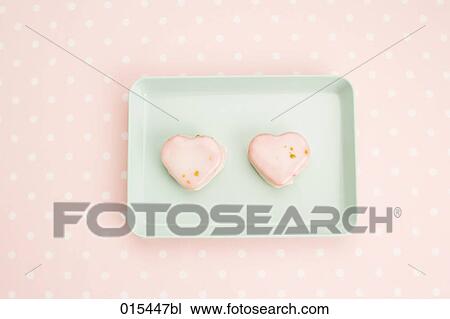 still life of two cookies in shape of heart View Large Photo Image Stock Image - still life of two cookies in shape of heart. Fotosearch