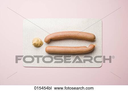 still life of two frankfurters with mustard View Large Photo Image Stock Image - still life of two frankfurters with mustard. Fotosearch