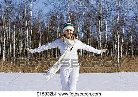teenage girl happily dancing outdoors in winter View Large Photo Image Stock Image - teenage girl happily dancing outdoors in winter. Fotosearch