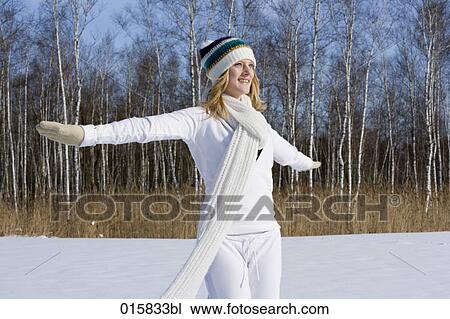 teenage girl happily dancing outdoors in winter View Large Photo Image Stock Image - teenage girl happily dancing outdoors in winter. Fotosearch