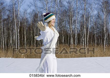 teenage girl happily dancing outdoors in winter View Large Photo Image Stock Image - teenage girl happily dancing outdoors in winter. Fotosearch
