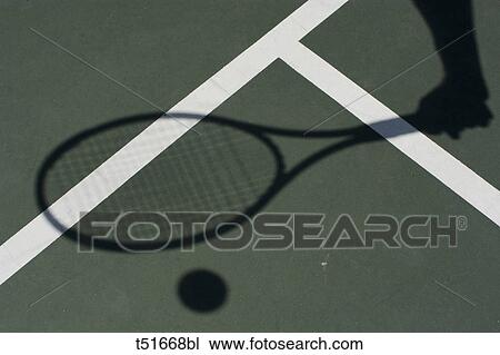 Tennis, shadow of racket in action View Large Photo Image Stock Image - Tennis, shadow of racket in action. Fotosearch