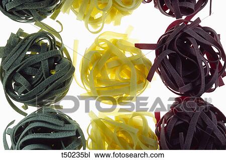 Tricoloured fettuccine View Large Photo Image Stock Image - Tricoloured fettuccine. Fotosearch