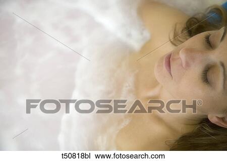 Woman at spa in jacuzzi View Large Photo Image Stock Image - Woman at spa in jacuzzi. Fotosearch