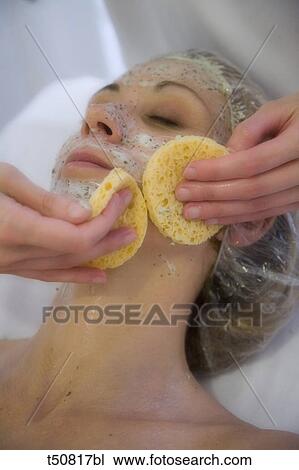 Woman getting facial mask View Large Photo Image Stock Image - Woman getting facial mask. Fotosearch