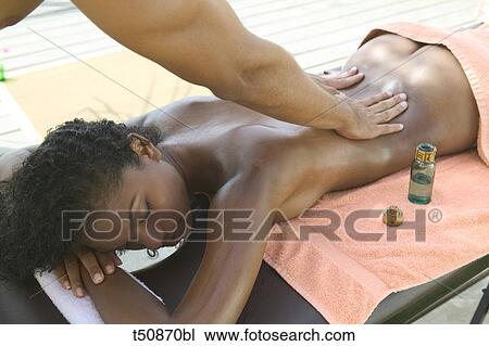 Woman having a massage View Large Photo Image Stock Image - Woman having a massage. Fotosearch