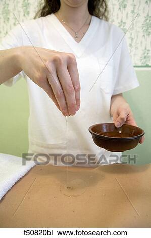 Woman having ayurveda treatment View Large Photo Image Stock Image - Woman having ayurveda treatment. Fotosearch