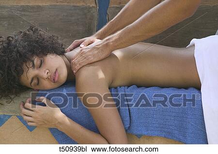Woman having massage View Large Photo Image Stock Image - Woman having massage. Fotosearch