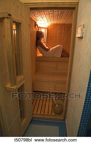 Woman in sauna View Large Photo Image Stock Image - Woman in sauna. Fotosearch