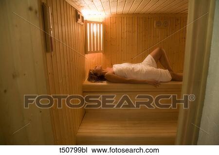 Woman in sauna View Large Photo Image Stock Image - Woman in sauna. Fotosearch