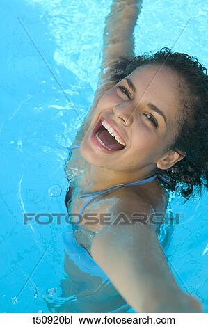 Woman in swimming pool View Large Photo Image Stock Image - Woman in swimming pool. Fotosearch
