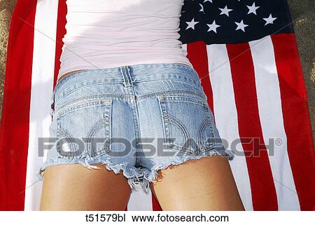 Woman lying on american flag View Large Photo Image Stock Image - Woman lying on american flag. Fotosearch