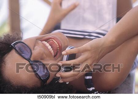 Stock Image - Woman phoning. Fotosearch