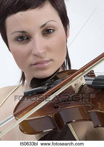 Woman playing violin View Large Photo Image Stock Image - Woman playing violin. Fotosearch