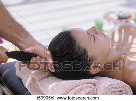 Woman receiving massage View Large Photo Image Stock Image - Woman receiving massage. Fotosearch