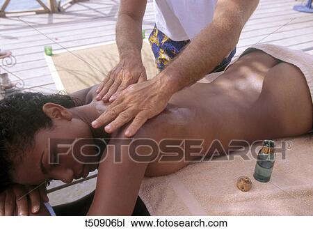 Woman receiving massage View Large Photo Image Stock Image - Woman receiving massage. Fotosearch