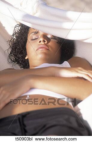 Woman sleeping in hammock View Large Photo Image Stock Image - Woman sleeping in hammock. Fotosearch