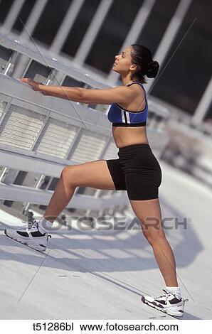 Woman stretching View Large Photo Image Stock Image - Woman stretching. Fotosearch