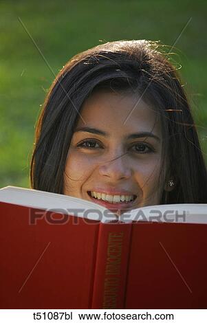 Woman with a book View Large Photo Image Stock Image - Woman with a book. Fotosearch