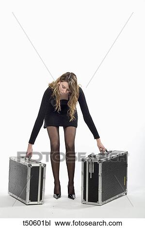 Woman with luggages View Large Photo Image Stock Image - Woman with luggages. Fotosearch