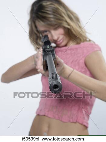 Stock Image - Woman with rifle. Fotosearch