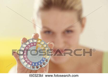 Woman with the pill View Large Photo Image Stock Image - Woman with the pill. Fotosearch