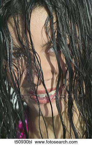 Stock Image - Woman with wet hair. Fotosearch