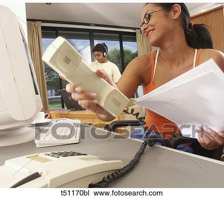 Woman working at home View Large Photo Image Stock Image - Woman working at home. Fotosearch