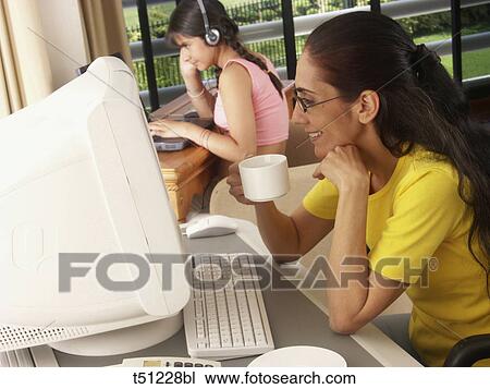 Woman working at home View Large Photo Image Stock Image - Woman working at home. Fotosearch