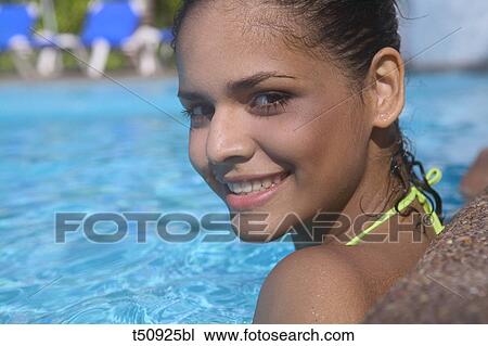 Woman's close up at swimming pool View Large Photo Image Stock Image - Woman's close up at swimming pool. Fotosearch