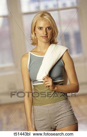 Woman's portrait in gym View Large Photo Image Stock Image - Woman's portrait in gym. Fotosearch