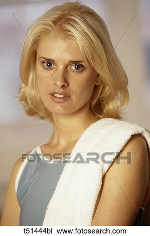 Stock Image - Woman's portrait in gym. Fotosearch