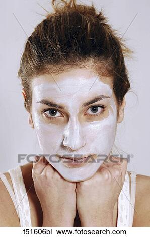 Woman's portrait with cream on her face View Large Photo Image Stock Image - Woman's portrait with cream on her face. Fotosearch