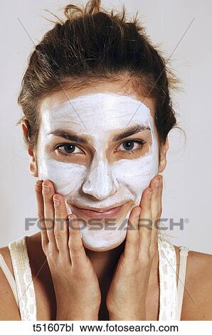 Woman's portrait with cream on her face View Large Photo Image Stock Image - Woman's portrait with cream on her face. Fotosearch